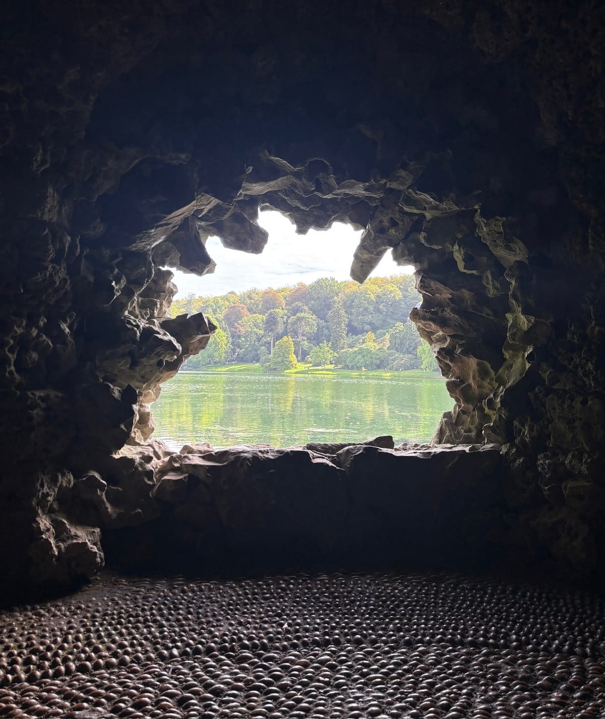 The view of the lake from inside the Grotto at Stourhead