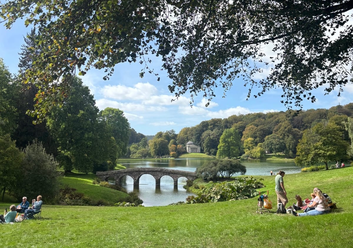 The Palladian Bridge at Stourhead with the Pantheon in the distance